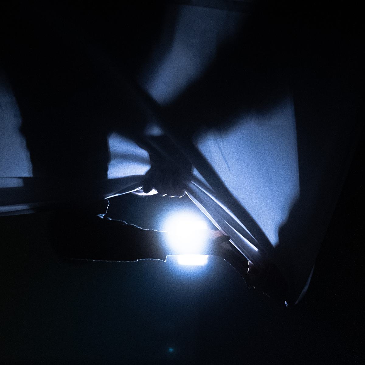 Hands in blue light
