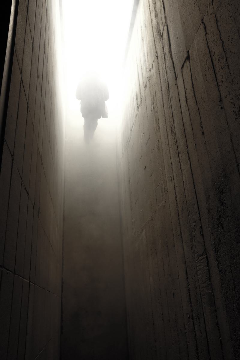 A visitor at the far end of the light
